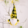 Bee gnome pendant with yellow black plaid hat and sunflower detail hanging on a branch - Black and Yellow Plaid Hat Style