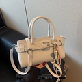 Minimalist cream white crossbody handbag for women featuring decorative strap and abacus charm - With Charm / Off White