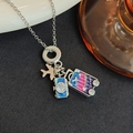 Ketting met reisthema, zilveren vliegtuig, blauwe camera en kleurrijke kofferbedel - Camera Vliegtuig Bagage Set / Zilver