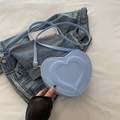 Lichtblauwe hartvormige lederen crossbody tas met 3D-reliëf en modieuze details - Blauw