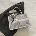 Silver tote bag with gray jacquard plant pattern and decorative silk scarf on handle - Silver