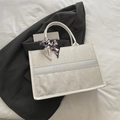 White jacquard floral tote bag with silver band and elegant silk scarf handle decoration - White
