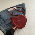Fashionable heart-shaped crossbody bag in wine red PU leather with adjustable strap - Burgundy