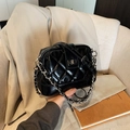 Elegant black quilted shoulder bag with glossy leather finish and silver chain strap - Black