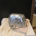 Silver quilted crossbody chain bag with metallic finish and classic diamond pattern - Silver