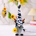 Gnomo di peluche con cappello a macchie di mucca bianco e nero e un girasole - Estilo barba