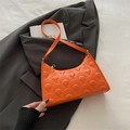 French baguette shoulder bag in bright orange with quilted shell texture finish - Orange