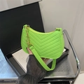 Neon green quilted handbag with V-shaped stitching and a gold chain strap - Green