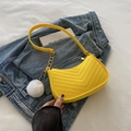 Bright yellow crescent underarm bag with V-quilting and decorative white pompom charm - Yellow with Cloud Pendant