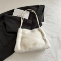 Chic cream white faux fur tote bag with minimalist drawstring straps for winter style - White