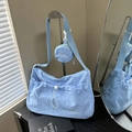 Light blue nylon shoulder bag with drawstring pocket and mini coin purse charm - Blue