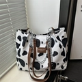 Fashion cow print canvas tote bag with brown leather handles and silver chain detail - Cow White