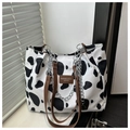 Fashion canvas tote bag with cow print pattern and brown leather handles for women - Cow White