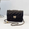 Classic black quilted crossbody bag with golden chain strap and round metal buckle lock - Black