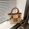 Petit sac seau en toile et cuir marron avec logo et anses en bambou dorées chic - Marron