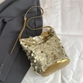 Elegant bucket bag featuring gold large sequins and adjustable crossbody strap - Gold