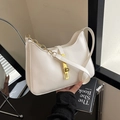Minimalist white leather baguette bag with a sleek vertical gold buckle and chain - White