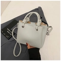 Chic beige bucket bag with litchi grain leather and knotted handle design - Blue Without Charm