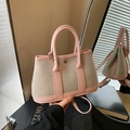 Pink and beige canvas bucket bag with leather trim and round handles for women - Pink