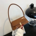 Minimalist caramel brown patent leather underarm bag with gold metal buckle - Brown