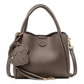 Deep taupe pebbled leather bucket bag with double handles and a cute dog charm accessory - Elephant Gray