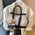 Chic canvas bucket bag in beige and black leather with cute teddy bear charm - Black With Bear Charm