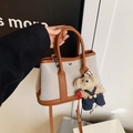 Brown leather trim canvas bucket bag featuring a cute teddy bear pendant and shoulder strap - Brown With Bear Charm