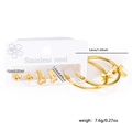 Detailed view of stainless steel earring set with ball studs, key studs and hoop charms - Cross Gold Style (EXRGE0376)