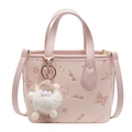 Pink embossed bucket bag with floral patterns, adjustable strap and a plush monster charm - No Pendant / Pink