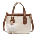 Chic cream leather bucket bag with embossed patterns and contrast brown straps - No Pendant / Off White