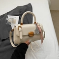 Cream white small square handbag with gold buckle and tennis racket charm accessory - Off-white