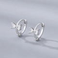 Elegant silver bow earrings featuring sparkling triangle zircon stones on a gray background - Silver (Zircon Butterfly)