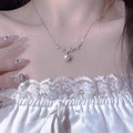 Elegant silver flower necklace with marquise zircons and white pearl on a model - Lucky Flower Pearl Necklace