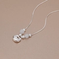 Elegant silver Fu character lock necklace with white jade beads on textured background - Silver Fu Character Style