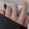 Minimalist silver moon ring with sparkling zircon stones on female index finger - Crescent Moon Silver Color Ring