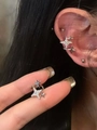 Detailed close-up of silver star ear cuff set with embedded sparkling zircons - Silver Star (Sparkling Star Ear Clip)
