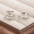 Detail view of silver crystal hoop earrings with 10mm inner diameter dimension - Silver Round Zirconia Huggie 10mm (EH7403YS)