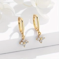 Macro shot of 18K gold earrings with four-petal flowers and cubic zirconia accents - Gold Clover Drop Hoop Earrings (AE01E00003-JS4)