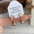 Detail of 925 silver champagne butterfly earrings with cat eye stones and golden pearls - Butterfly Champagne Pearl Earrings