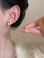 Detailed view of yellow square crystal stud earrings with a sparkling zircon halo - Gold Sugar Cube Style