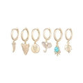 Detailed close-up of 6-piece golden earring set with animal and leaf charms on white back - Horn Leopard Owl Elephant Set (S-E1620)