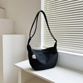 Minimalist black crescent crossbody bag in canvas with cute white puppy keychain pendant - Black