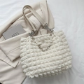 Chic cream-white tote bag featuring 3D bubble pleated texture and pearl chain straps - White
