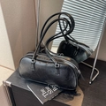 Vintage black ballet-style bow pillow bag in textured faux leather with silver zipper - Black