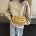 Minimalist yellow PU leather chest bag for women with woven zip pulls and brand logo - Khaki