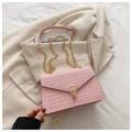 Pink woven texture shoulder bag with gold chain strap and metal lock closure - Pink