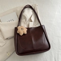 Dark brown faux leather tote bag with U-shaped stitching and plush star charm - With Plush Charm / Brown