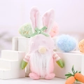 Pink Easter gnome plush with rabbit ears and white beard on festive background - Pink