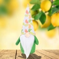Green summer gnome doll with citrus fruit print hat and white beard on wood table - Green Lemon Gnome