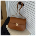 Detail of caramel faux leather shoulder bag with gold metal snap buckle and flap closure - Brown